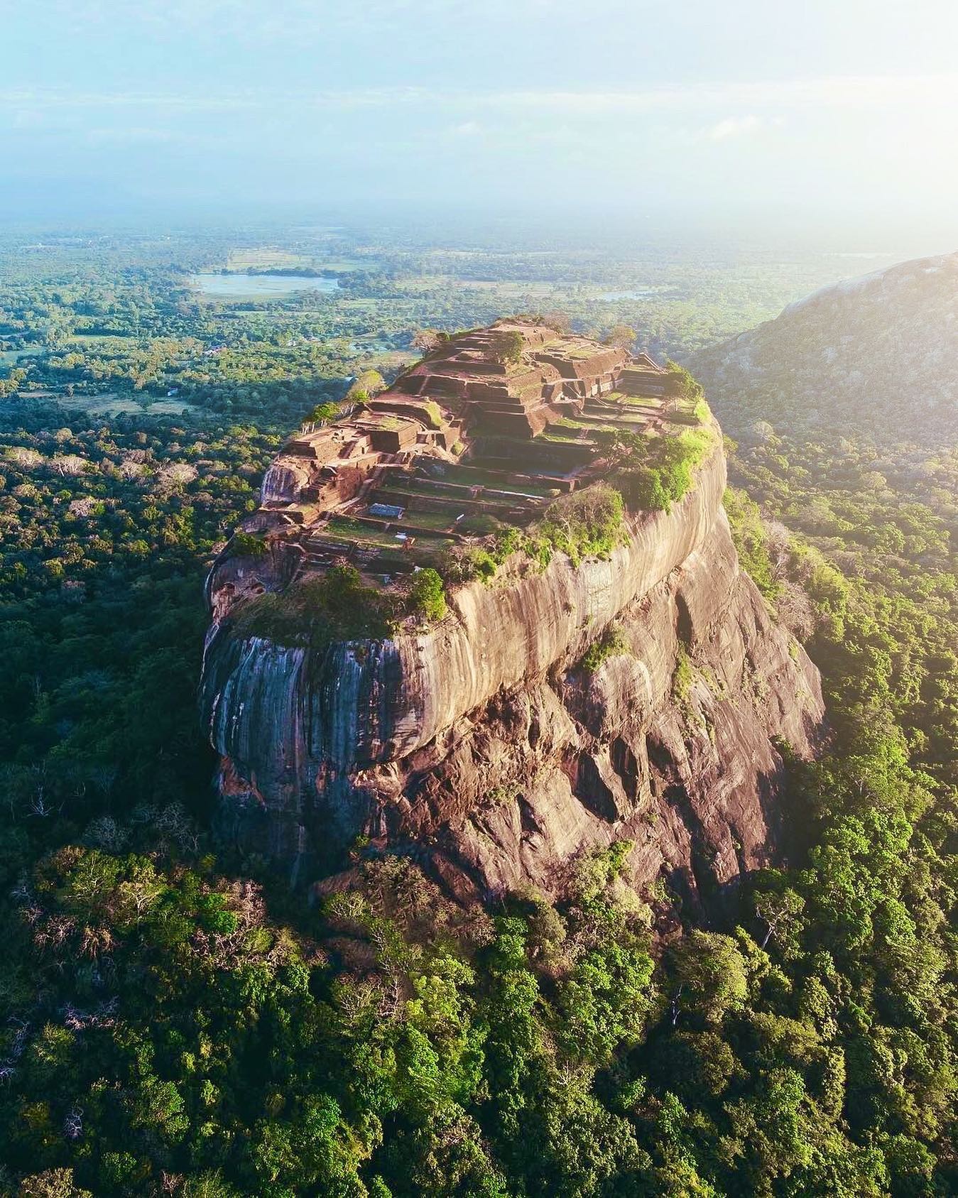 The Lion's Rock in Sigiriya is a monumental feature of Sri Lanka. It's possible to hike to the top of the rock to get a breathtaking view. The Lion's Rock is a part of the UNESCO world heritage since 1982. ⛰
.
.
.
.
#roamtheplanet #eclectic_shotz #moodygrams #mg5k #moodyports #beyondthelands #thegreatplanet #worldplaces #nature_globepix #stayandwander #speechlessplaces #bestdiscovery #dreamingtravel #moodnation #earthoutdoors #earthoutdoors10k #exploringourglobe #wonderlustsrilanka #srilankadaily #feelsrilanka #omgsrilanka #exploresrilanka #visitsrilanka #toursrilanka #vacationinsrilanka #sigiriyarock #sigiriya