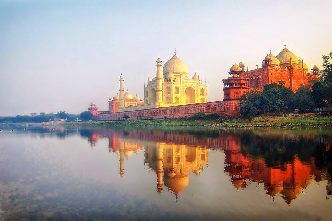 The Taj Mahal, the Great Gate (Darwaza-i rauza) and its outlying buildings reflecting the Yamuna river at #sunset in Agra, India.

The Taj Mahal is actually a mausoleum in the city of Agra, built by the Mogul emperor Shah Jahan between 1592–1666 in memory of his wife. It was completed around 1649. It is a #UNESCO World Heritage Site and one of the icons of India. Most trips will (and should) include a trip to the Taj along with a date with the Dalai Lama, a tour around the pink city of #Jaipur.

#TajMahal #India #CGE #Agra #mytajmemory #IncredibleIndia #mystic #journey #sunset #inspiration #travel #Rajasthan #ttot #worldplaces #wanderlust #travelbug #travelgram #travelpics #travelingram #travelphoto #explore #expedition #asia