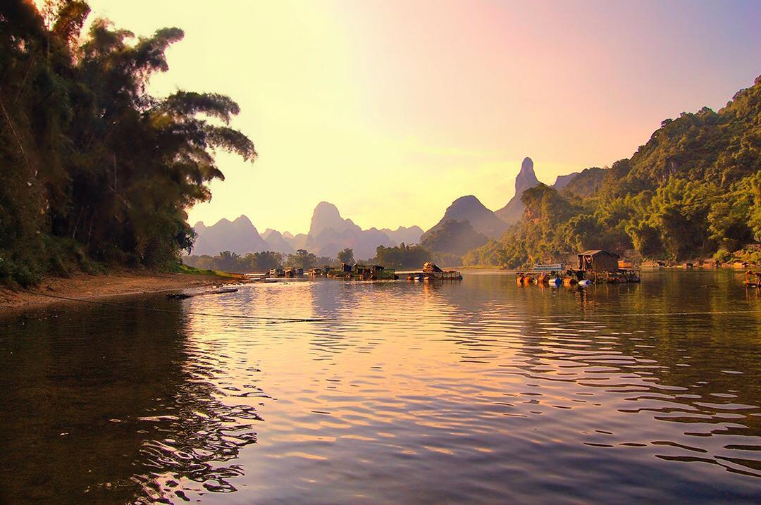 Makeshift riverboats on the tranquil Li River in province of Guangxi in China, just before #sunset.

The scenery in the area is breathtaking and could easily be mistaken for the CGI landscapes of James Cameron’s Avatar. The region of Guangxi, where the Li River flows, competes with that of the Yangtze River or Yellow Mountains and arguably possesses China’s most picturesque scenery – so much so that its beauty is recognised and displayed on the current series of the Chinese 20 yuan banknote.

#liriver #China #Guilin #Yangshuo #Guangxi #River #mountains #fisherman #BeautifulGuangxi #Yangzhou #Xingping #travel #travelgram #wanderlust #vacation #instatravel #adventure #view #travelphotography #rivertrip #boattrip