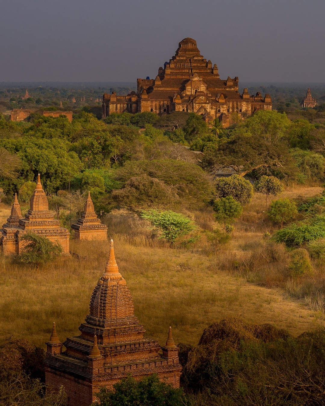 The temples of Bagan in #Myanmar – the world’s largest and densest concentration of Buddhist temples, pagodas, stupas and ruins. ⠀⠀
⠀⠀
Founded in the second century AD, the kingdom of Bagan once had over 10,000 Buddhist temples, pagodas and monasteries, all constructed between the 11th and 13th centuries. We visited during our cycling tour of Myanmar with @gadventures and @lonelyplanet.⠀⠀
⠀⠀
As it’s located in an active earthquake zone, Bagan has suffered many earthquakes over the ages, the most recent of which in 2016 destroyed over 400 buildings and damaged hundreds more. Today, the remains of ‘only’ 2,000 temples and pagodas can still be seen, many of which are undergoing repairs and restoration.⠀⠀
-⠀⠀
-⠀⠀
-⠀⠀
-⠀⠀
-⠀⠀
-⠀⠀
-⠀⠀
#gadventures #Bagan #Burma #Mandalay #mystic #temples #pagoda #stupa #travelgram #instatravel  #tranquility #Burmese #neverstopexploring #keepitwild #lpPathfinders #ic_adventures #global_hotshotz #lpPathfinders #worldtravelbook #exploretocreate #theoutbound