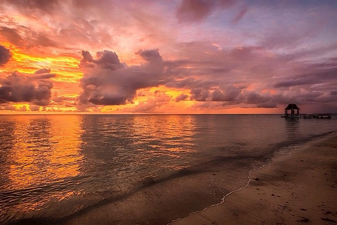 Our first Mauritian sunset off the northern beach of Trou-aux-Biches was pretty dramatic. Just five minutes earlier the heavens were open and the clouds were banked along the coast.⠀
⠀
We're staying at @beachcomber_hotels at Trou-aux-Biches on the northern shores of Mauritius and despite the dramatic weather there's a quiet and sleepy feel to this unbroken stretch of sand up here. ⠀
⠀
#Mauritius #travel #ilemaurice #beach #Africa #Indian #BeachcomberExperience #indianocean #paradise #islandparadise #wanderlust #igersmauritus #sky #amazing #summertime #sunset #beach #nature