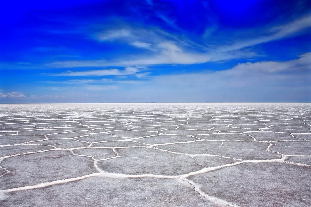 Salar de Uyuni in Bolivia is one of the most surreal landscapes in the world. Miles and miles of pure white terrain are almost blinding in their beauty. The flats provide the perfect backdrop for any photographer.

Salar de Uyuni is the world’s largest salt flats, spanning 10,582 square kilometres and containing an estimated 10 billion tonnes of salt. The flats were formed from what was originally Lake Minchin, a giant prehistoric lake. The lake largely evaporated under the scorching Andean sun leaving behind a thick crust of salt – what we know today as the salt flats of Salar de Uyuni.

Merry Christmas everyone!

#SalarDeUyuni #Bolivia #salt #photography #nature #landscape #Uyuni #Salar #trip #southamerica #travel #travelgram #wanderlust #vacation #instatravel #adventure #view #travelphotography #roadtrippin