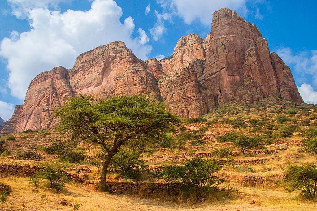 The striking Tigrayan landscape of northern #Ethiopia is some of the most beautiful in the country. ⠀
⠀
We spent three days hiking to the rock-hewn churches in the Gheralta region of Tigray where churches and monasteries are carved from the cliff faces, built into pre-existing caves or constructed atop some inconceivable position high in the mountains.⠀
-⠀
-⠀
-⠀
-⠀
-⠀
-⠀
#tigray #tigraychurches #amazingafrica #visitethiopia  #africa #ethiopian #ethiopiamountains #everydayethiopia #everydayafrica #Habesha #Abyssinian #Abyssinia #exploretocreate #maryamkorkor #rockhewn #abunayemataguh #ethiopianchurch #beautifuldestinations #bestintravel ⠀
#Ethiopianadventure #neverstopexploring #keepitwild #thegreatoutdoors #lpfanphoto @lonelyplanetmags #lppathfinders