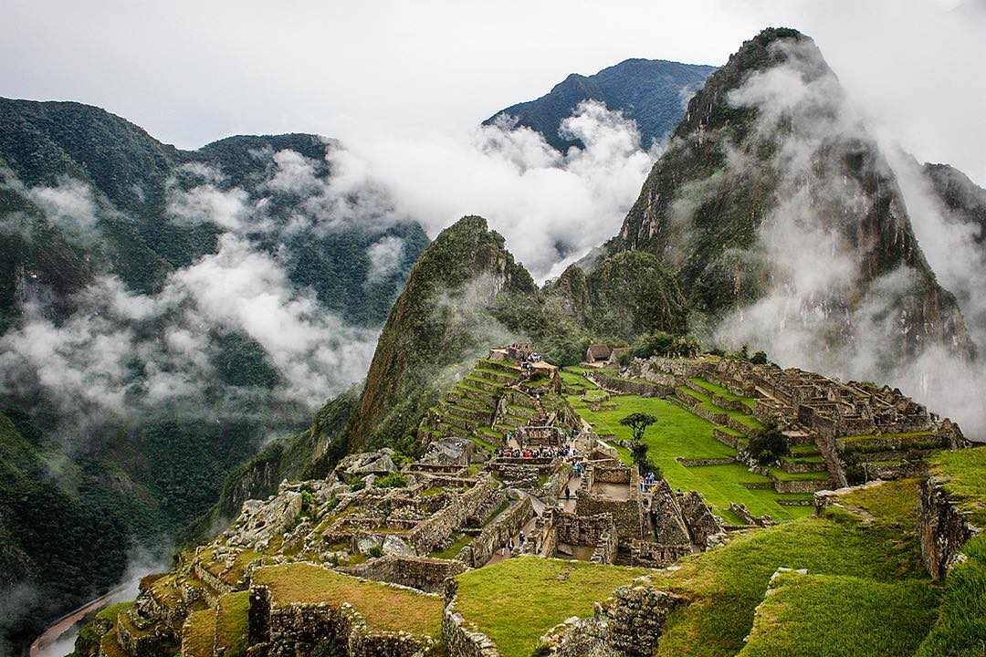 Thick fog and cloud clears briefly to reveal the peak of Huayna Picchu towering above the ruins of Machu Picchu in Peru. ⠀
⠀
Having been at the sacred site for several hours we were worried we would never see the iconic pyramid that dominates one of the most recognisable landscapes in the world. Luckily the mists began to clear as the breeze picked up. This was our first comprehensive view of the ruins in all their glory.⠀
⠀
The peak of Huayna Picchu is 2,720m (8,920ft) above sea level, or about 360 metres (1,180ft) higher than Machu Picchu. The name Huayna Picchu is Quechua for 'young pyramid'. ⠀
-⠀
-⠀
-⠀
-⠀
-⠀
-⠀
-⠀
#MachuPicchu #Peru #Cusco #TravelBoldly #Perú #SouthAmerica #Lima #IncaTrail #hiking #salkantaytrek #salkantay #salkantaytrail⠀
#salkantaytrekking #salkantaypass #hikingadventures #getoutstayout ⠀
#wildernessculture #adventurepic #theoutbound #adventureculture #roamtheplanet #wellhiked #stayandwander #takeahike