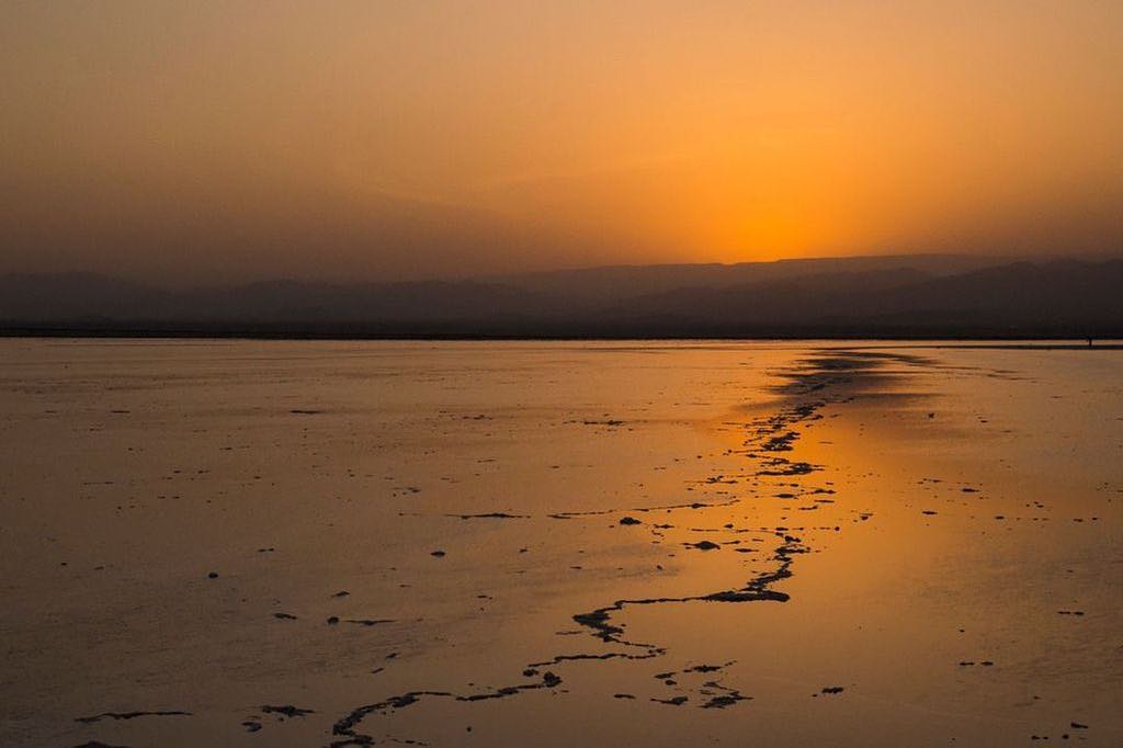 A striking #sunset over the salt flats of Lake Karum (aka Lake Asale) in the Afar Region of Ethiopia. ⠀
⠀
Lake Karum lies -120 m (-394ft) below sea level in the Danakil Depression – one of the most inhospitable places on Earth. It is part of the East African Rift where three continental plates are being slowly torn apart.⠀
-⠀⠀
-⠀⠀
-⠀⠀
-⠀⠀
-⠀⠀
-⠀⠀
-⠀⠀
#LakeAsale #Asale #LakeKarum #Karum #Dallol #Danakil #DanakilDepression #Afar #AfarRegion #adventurethatislife #liveoutdoors #awesomepix #travelawesome #danikaldesert #hottestplace #hottestplaceonearth #extemeheat #optoutside #neverstopexploring #keepitwild #thegreatoutdoors #lpfanphoto #lppathfinders @lonelyplanetmags