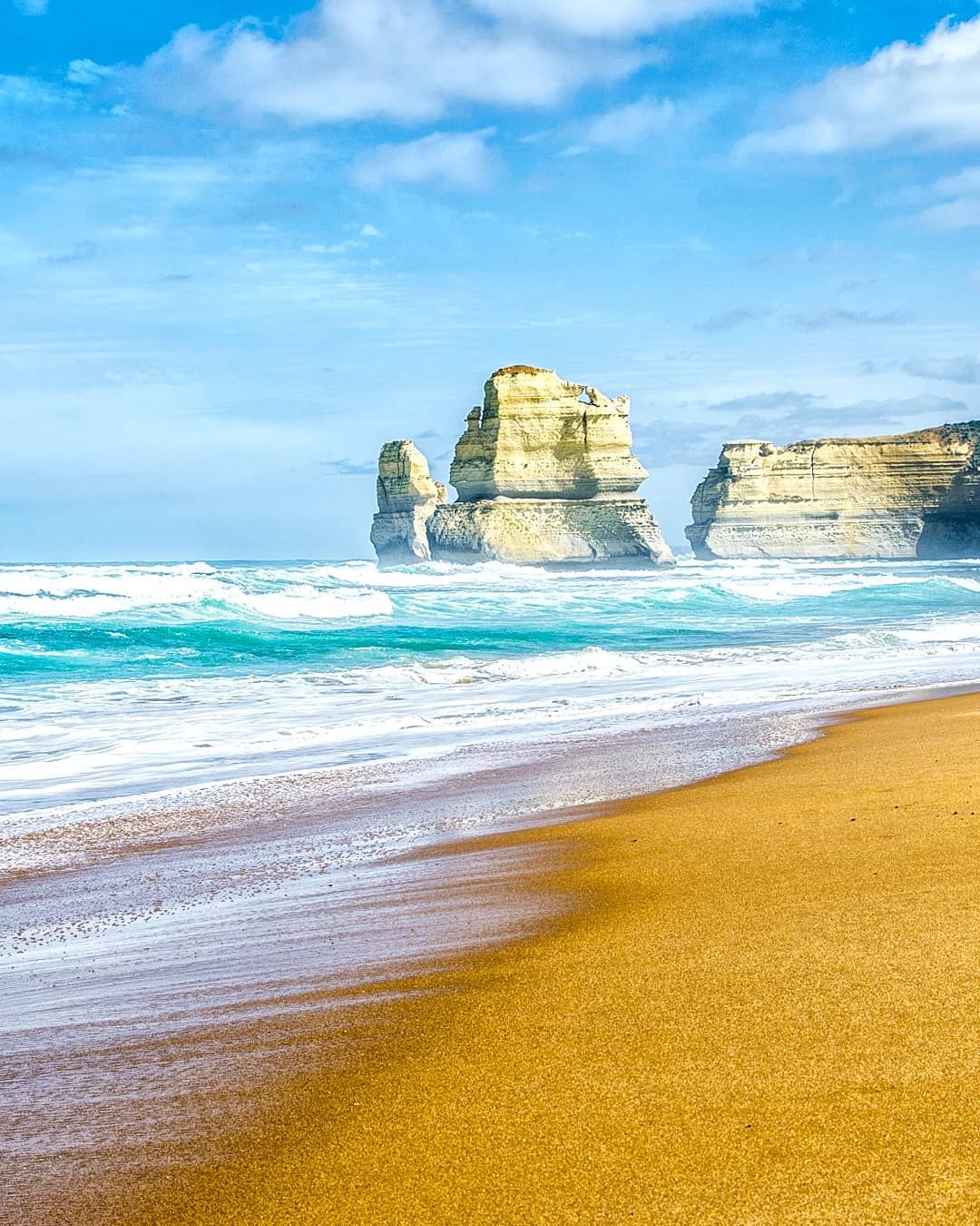 The Gog and Magog offshore stacks viewed from the beach at Gibson Steps on the Great Ocean Road in Victoria, Australia. ⠀
⠀
Although not considered part of the nearby 12 Apostles, the sheer scale of natural sculpting evident at the Gog and Magog is every bit as impressive.⠀
⠀
Gog and Magog are the local names given to the two stacks that can be viewed from the viewing platform and beach at the bottom of the steps – as long as the Southern Ocean permits it that is!⠀
⠀
We were driving the @greatoceanroad in #Victoria with @hertzaustralia.⠀
-⠀⠀
-⠀⠀
-⠀⠀
-⠀⠀
-⠀⠀
-⠀⠀
-⠀⠀
#gibsonsteps #gibsonstepsbeach #gor #seegor #twelveapostles #12apostles #greatoceanroadtrip #portcampbell #shipwreckcoast #greatoceanroad #VictoriaAustralia #seevictoria #visitvictoria #theoutbound #PortCampbellNationalPark #ocean #oz #roadtrip #roadtripaustralia #roadtripping #driveaustralia #wonderful_places #oceanlovers #apostles #seeaustralia #lppathfinders #ausgeo