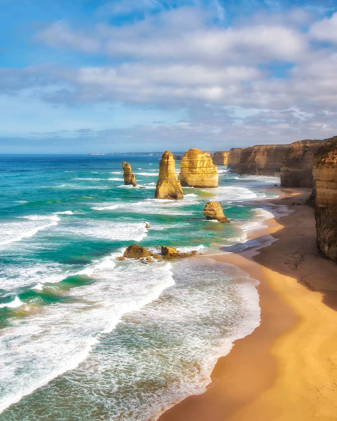 The rugged rock stacks of the iconic 12 Apostles along Australia's famous Great Ocean Road – one of the world’s most scenic coastal drives and one of @lonelyplanet’s Epic Drives of the World. ⠀
⠀
Located near Port Campbell and within the Port Campbell National Park in Australia, the giant limestone stacks tower 45m (148ft) above the tempestuous ocean below. Behind the eight remaining stacks (the others are said to have collapsed) are lines of imposing 70m (230ft) high cliffs.⠀
-⠀
-⠀
-⠀
-⠀
-⠀
-⠀
#gor #seegor #twelveapostles #12apostles #portcampbell #greatoceanroad #VictoriaAustralia #seevictoria #visitvictoria  #PortCampbellNationalPark  #roadtripaustralia #driveaustralia #seeaustralia #lppathfinders #lonelyplanet