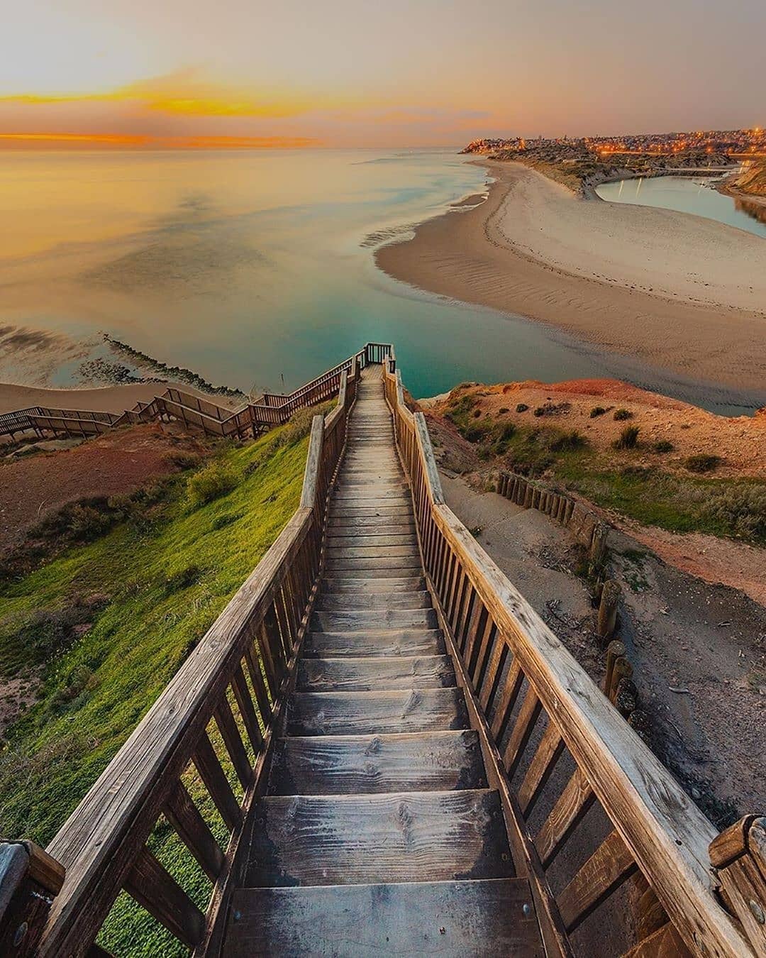 Reposted from @exploringaustralia_ -  Tonight we bring you a new and magical capture of one of our team’s favourite places in the country and maybe even on the planet, the Port Noarlunga staircase 😍 This view really makes you feeling like you’re about to step into another world of beauty and peace 💕 📷 @flowcreator
.
.
#exploringaus #exploringaustralia #exploringourglobe #exploreaustralia #aus #australia #australian #exploring #explorer #explore #seeaustralia #australiagram #westernaustralia #southaustralia #queensland #newsouthwales #victoria #tasmania #travelphotgraphy #roadtrip  #instatravel #travelgram #portnoarlunga #beach #staircase