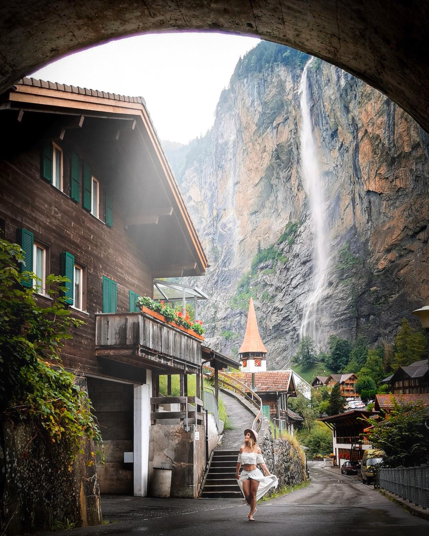 Woke up in a fairytale village surrounded by 72 waterfalls. The mix of sun and rain was incredibly beautiful 😍 and even how the waterfalls changed their colors during the heavy rain - first time for me to observe this 🤩
.
.
📸by @luca.schranz 
.
.
#lauterbrunnen #berneroberland #schweiz #schweiz🇨🇭 #Switzerland #switzerland🇨🇭 #fairytale #travel #travelgirl #wanderwomen #iamtb #waterfall #staubbachfall