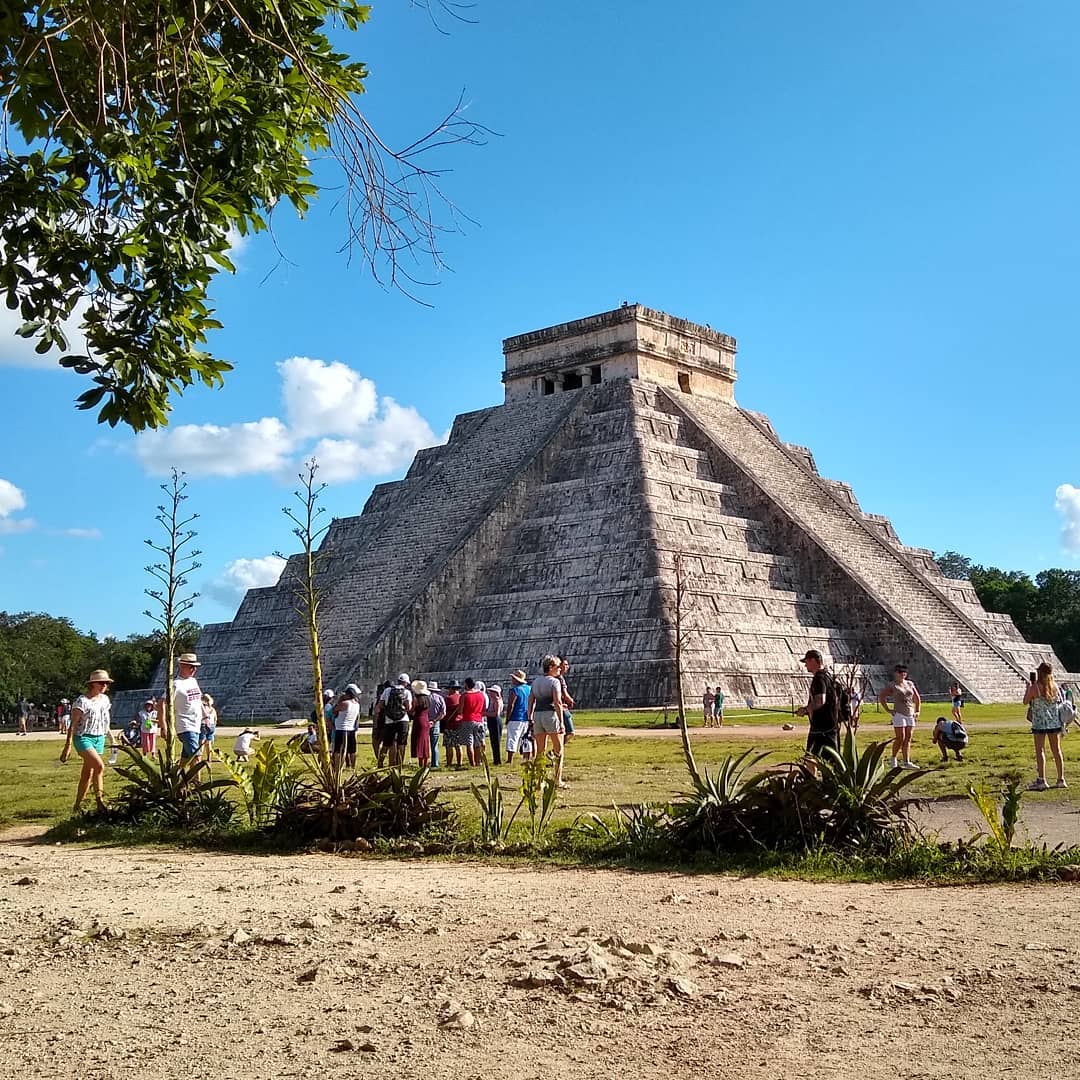We're at Chichén Itzá, one of the Seven Wonders of the World. It's incredible! You used to be able to climb the 91 steps to the top (I did it once. The trip down was terrifying), but not anymore. Too many people took souvenirs from the monument. It's still fantastic! #chichenitza #mexico #messysuitcase #travel #travelblog #travelblogger
