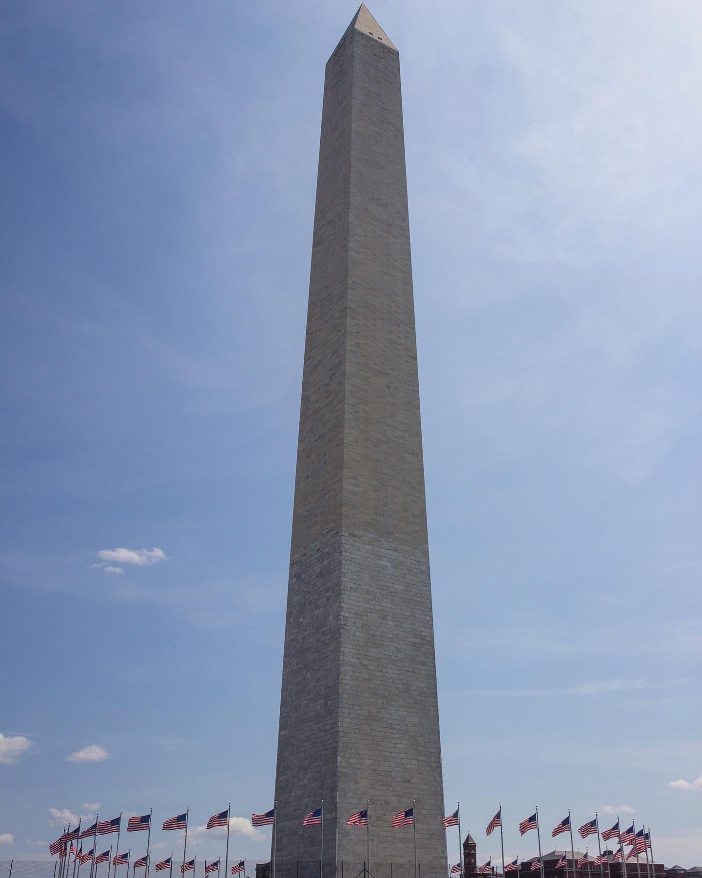 The Washington Monument is an obelisk on the National Mall in Washington, D.C., built to commemorate George Washington, once commander-in-chief of the Continental Army and the first President of the United States. Located almost due east of the Reflecting Pool and the Lincoln Memorial, the monument, made of marble, granite, and bluestone gneiss, is both the world's tallest predominantly stone structure and the world's tallest obelisk. It is the tallest monumental column in the world if all are measured above their pedestrian entrances. It was the tallest structure in the world from 1884 to 1889, when it was overtaken by the Eiffel Tower in Paris.
.
.
#washington #washingtondc #george #georgewashington #obelisk #usa #us #unitedstates #firstpresident #districtofcolumbia #starsandstripes #flag #travel #capital #lincoln #mall #themall #capitol #travelling #bluesky #nationalmall #thenationalmall