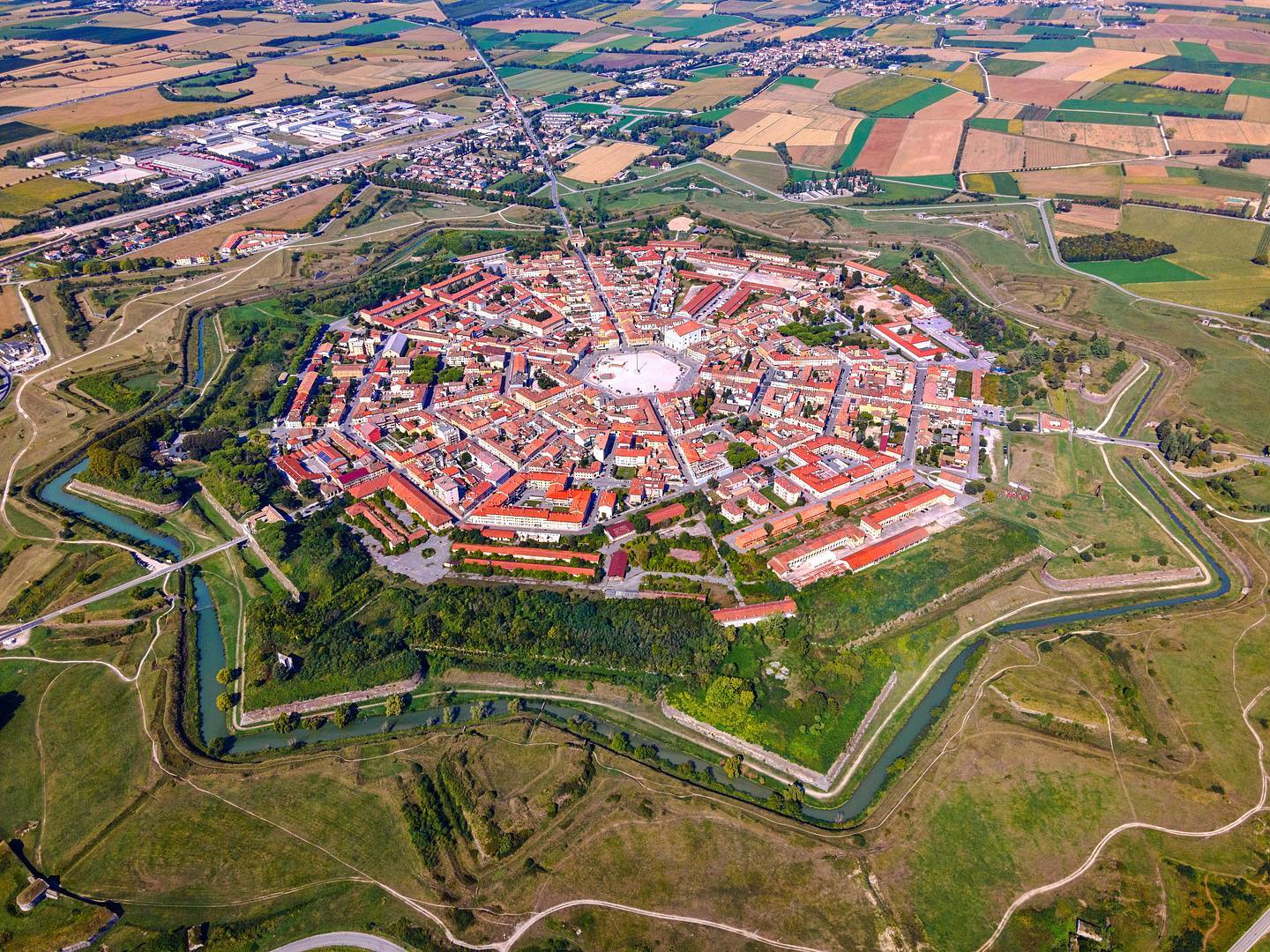 A star on earth 💫
.
Palmanova is a town and comune in northeastern Italy. The town is an example of star fort of the late Renaissance, built up by the Venetian Republic in 1593.
.
.
#palmanova #palmanovaoutlet #palmanovaoutletvillage #palmanovaitaly #italy #italia #star #unesco #visititalia #italytrip #südtirol #star #droneheroes #dronesdaily #droneshots #italydrone #dronephotography #dronefly #dronessky #dji #djimavicair2 #djidrone #droneporn #dronestagram #dronepilot #dronelife #droneitalia #dronephoto #dronepics #dronedaily #visititaly @best_italy_photos @visititalyofficial @super.italy @map_of_italy @exploring_ita @ig_italia @djiglobal @djimavicmini @djimavicair2 @dji_official @dji__photos @djipro @dronemperors @drones.sky @drone.globe @dronedesire @dronepals @drone.exec @travelanddestinations