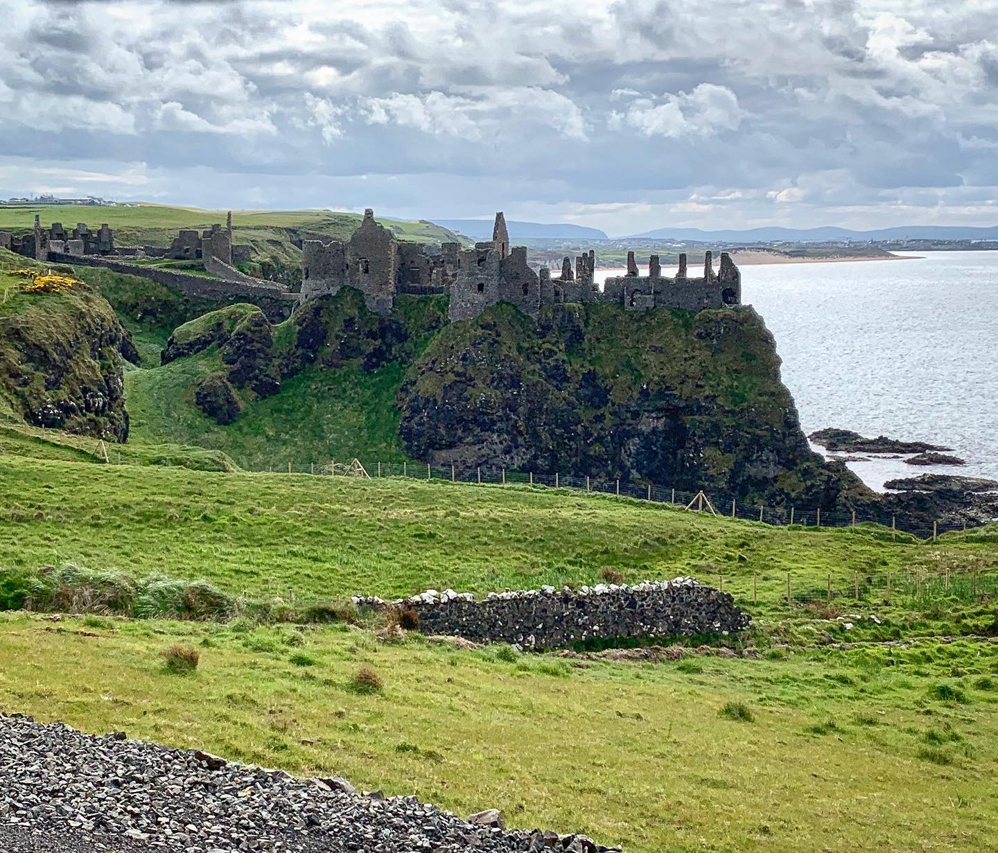 Dunluce Castle is a now-ruined medieval castle in Northern Ireland. It is located on the edge of a basalt outcropping in County Antrim, and is accessible via a bridge connecting it to the mainland. The castle is surrounded by extremely steep drops on either side, which may have been an important factor to the early Christians and Vikings who were drawn to this place where an early Irish fort once stood.
.
#dunlucecastle #ireland #travel #travelgram #travelgrams #travelphotography #travelblogger #traveller #travellers #travels #traveler #travelers #beautiful #wonderful_places #reisen #irish #bestirelandpics #atlanticocean #atlantic #sea