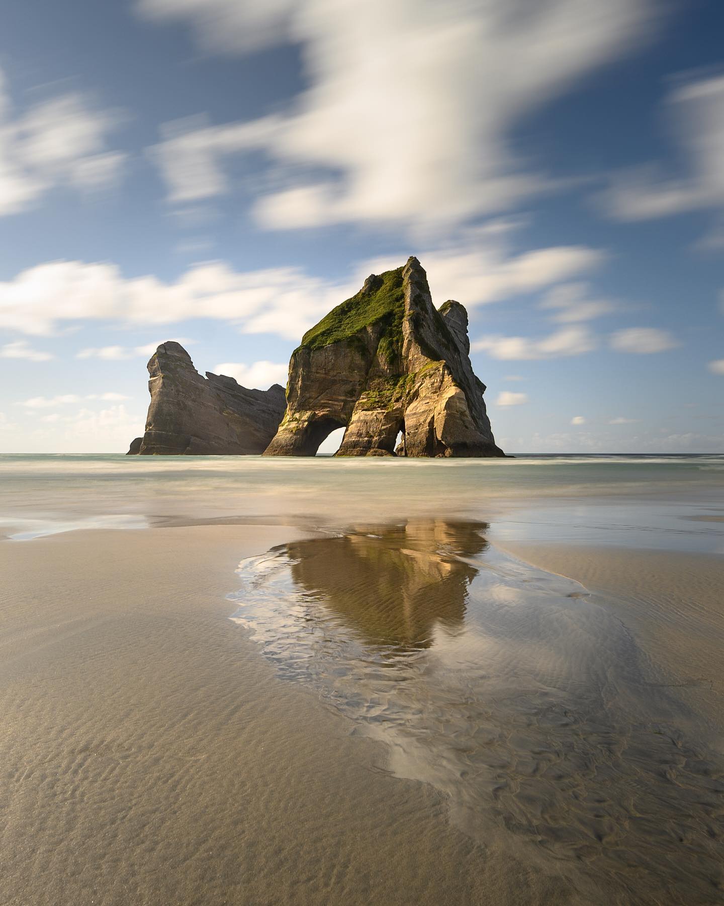Wharariki Beach and its Archway Islands are definitely worth the long drive and the remoteness. Add to that the relentless wind & waves, the caves, the sand dunes, the wildlife and the gigantic jagged rocks - no wonder this place features among the Windows 10 wallpapers 🌅
.
.
.
.
.
#whararikibeach #nz #tasman #tasmansea #wharariki #nzsouthisland #purenewzealand #purenz #puponga #discovernz #abeltasman #nzgeo #raw_australia_nz #realrawnz #nzmustdo #nzmustsee #nouvellezelande #nouvellezélande #nzroadtrip #nikonnz #bbcearth #newzealand #aotearoa #plagedereve #nzsummer #nztravel #nzphotographer #nzlife #longexposure