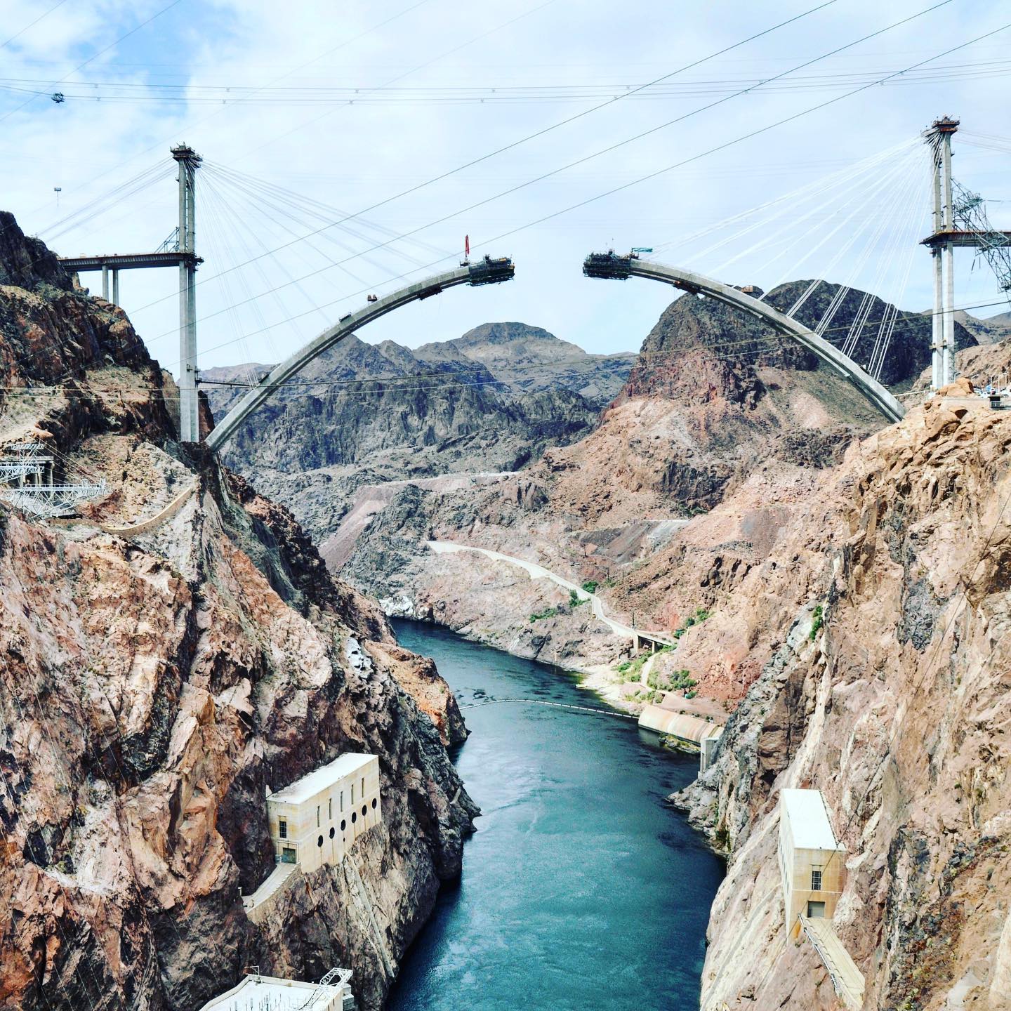 Hoover Dam - Mike O'Callaghan-Pat Tillman Memorial Bridge
The bridge connects Arizona and Nevada. When under construction, the bridge was referred to as the Hoover Dam Bypass Project. It is now named the Mike O'Callaghan-Pat Tillman Memorial Bridge. The photo must have been taken during our first road trip in 2009.
#usatravels #roadtripusa🇺🇸 #ontheroad #2009 #hooverdam #nevada #arizona  #coloradoriver #mikeocallaghanpattillmanmemorialbridge #bridgephotography #bridges #underconstruction