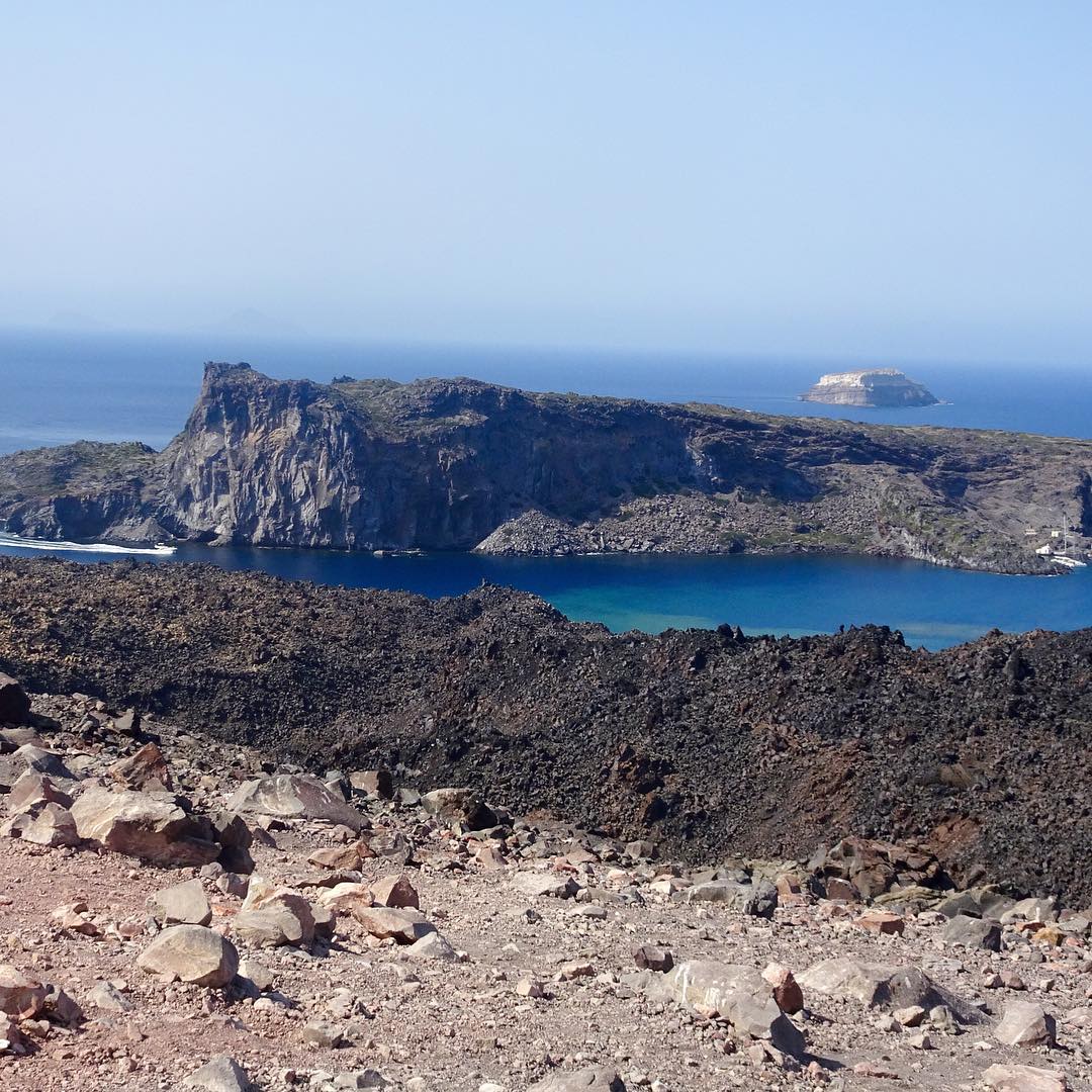 First and only #hike I've been on all #summer2015. But boy, I #madeitcount. View from the top of #santorini's #volcano #NeaKameni looking towards #PaleaKameni. 😎☀️🌋 #europe #water #sunshine #sea #fun #sun #travel #travelbug #traveling #wanderlust #instafood #instatravel #instagood #igtravel #igdaily #mordor #santorinigreece #Cyclades #caldera #nofilter <--for real! I didn't even straighten the horizon. 😂  #fira #thira #greekislands